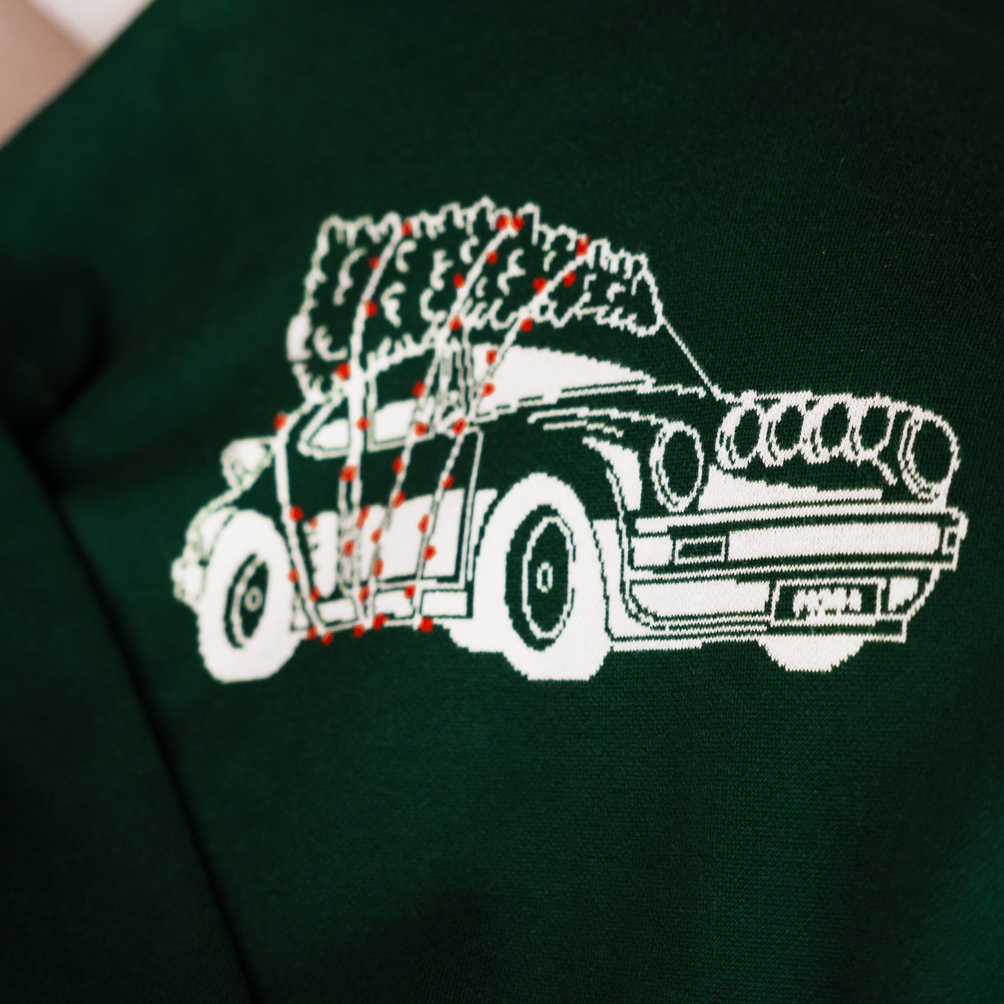DRIVEN BY LEGACY SWEATER